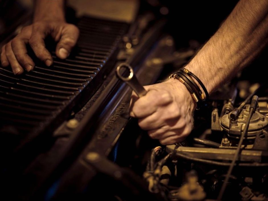 Technician performing diagnosis
